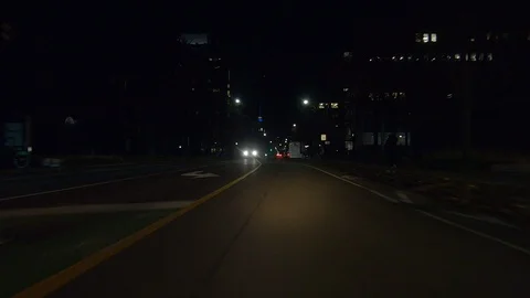 Driving plate POV low angle on Toronto city streets and highways at night Stock Footage 120161795