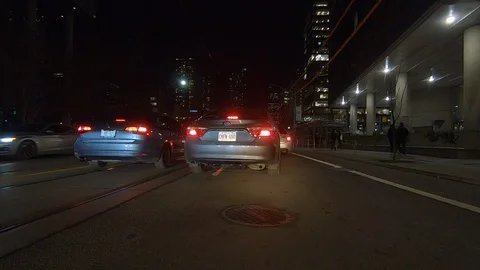 Driving plate POV low angle on Toronto city streets and highways at night Stock Footage 120164689