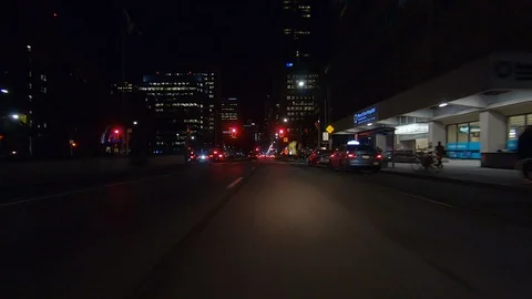 Driving plate POV low angle on Toronto city streets and highways at night Stock Footage 120165187