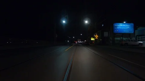 Driving plate POV low angle on Toronto city streets and highways at night Video stock 120167075