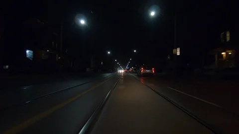 Driving plate POV low angle on Toronto city streets and highways at night Stock Footage 120168299