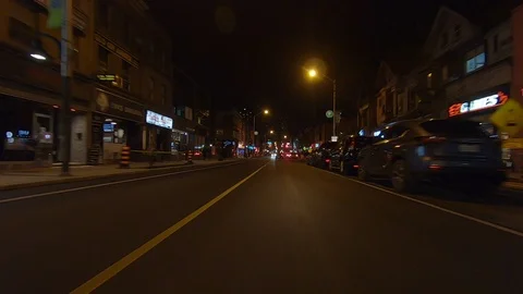 Driving plate POV low angle on Toronto city streets and highways at night Stock Footage 120169144