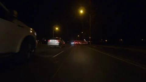 Driving plate POV low angle on Toronto city streets and highways at night Stock Footage 120171785