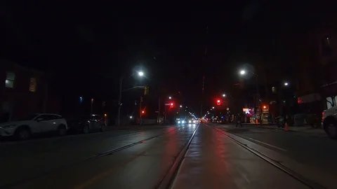 Driving plate POV low angle Toronto dark city streets at night downtown urban Stock Footage 122027729