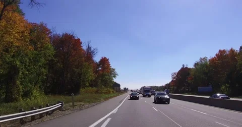 Driving plate POV rear view driving on highway Stock Footage 68347370