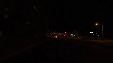 Driving plate POV reverse shot very dark night on the road Stock Footage 140982933