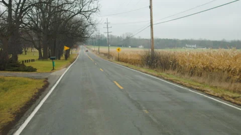 Driving plate: rear angle on rural road D HD Stock Footage 45409223