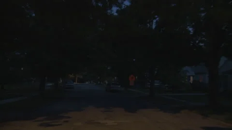 Driving plate, rear view, night: middle class suburb E Stock Footage 40687166