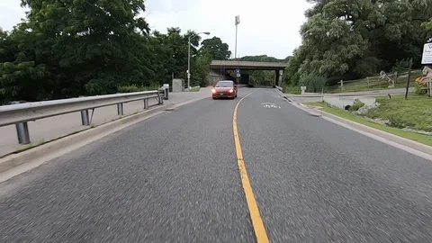 Driving plate reverse POV highway driving with cars and trucks traffic Stock Footage 112922935
