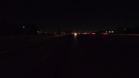 Driving plate of reverse rear view shot roads and highways on a very dark night Stock-Footage 155871323