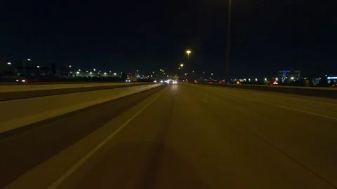 Driving plate of reverse rear view shot roads and highways on a very dark night Vídeo Stock 155871403