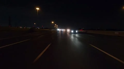 Driving plate of reverse rear view shot roads and highways on a very dark night Видео 155871501