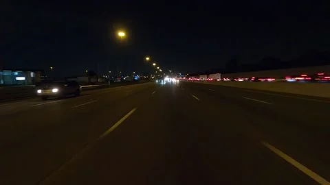 Driving plate of reverse rear view shot roads and highways on a very dark night Stock-Footage 155871524