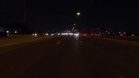 Driving plate of reverse rear view shot roads and highways on a very dark night Stock-Footage 155871601
