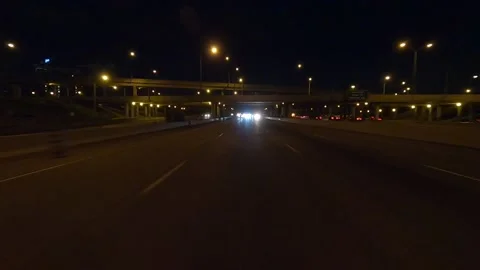 Driving plate of reverse rear view shot roads and highways on a very dark night 库存影片 155871665
