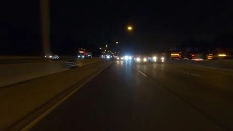 Driving plate of reverse rear view shot roads and highways on a very dark night Vidéo 155871683