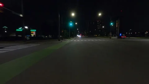 Driving plate of reverse rear view shot roads and highways on a very dark night Stock-Footage 155872150