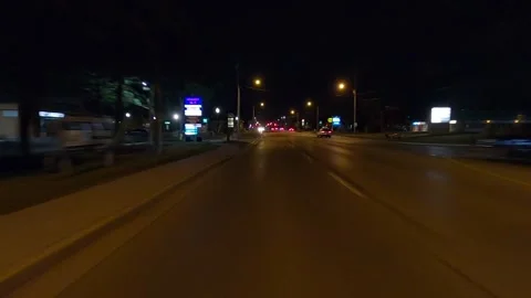 Driving plate of reverse rear view shot roads and highways on a very dark night 库存影片 155872213