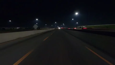 Driving plate of reverse shot roads and highways on a very dark night Stockbeeldmateriaal 155889217
