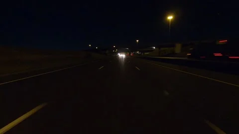 Driving plate of reverse shot roads and highways on a very dark night 스톡 동영상 156438324