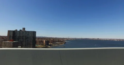 Driving Plate side 90 degree angle view out car driving over Throgs Neck Bridge Vidéo 88329798