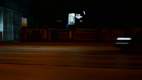 Driving plate side Left, car moves at the night street with car traffic 스톡 동영상 99585158