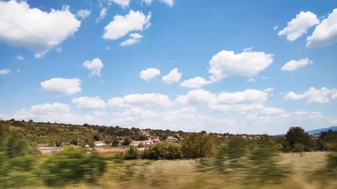 Driving Plate Side View. Cumulus clouds and trees in a cloudy summer day. Stock Footage 114355371