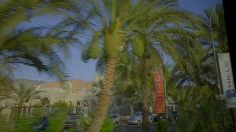 Driving Plate Side View Moving Through a City In Car (Petra Jordan) Stock-Footage 102896101