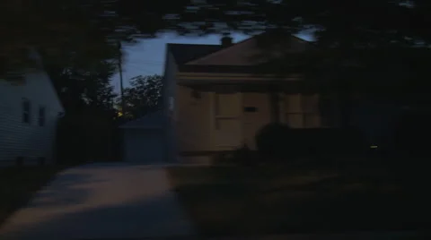 Driving plate, side view, night: middle class suburb C Stock Footage 40687029