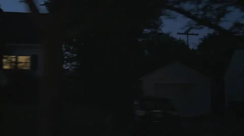 Driving plate, side view, night: middle class suburb D Stock Footage 40687048