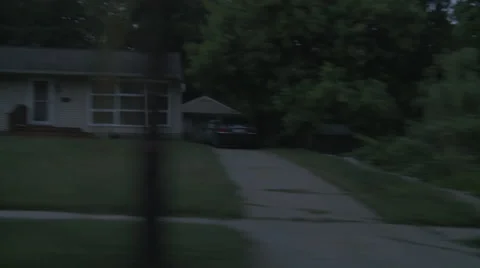 Driving plate, side view, night: middle class street C Stock Footage 40687396