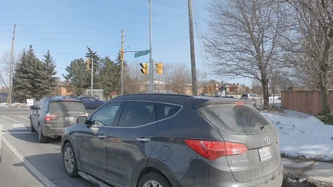 Driving plate side view suburban and urban sprawl Stock Footage 104401563