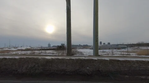 Driving plate side view suburban and urban sprawl Stock Footage 104451548