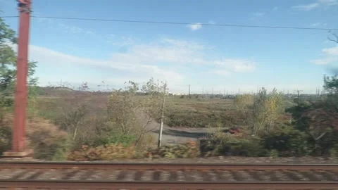 "Driving Plate" :  Train window view through the Meadowlands of New Jersey Stock Footage 163295749