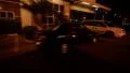 Driving Plates Night S03C02 CAM6 Three Quarter R View Warehouses in Downtown HD Footage