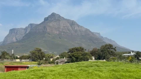 Driving POV of Devil's Peak Mountain Rising Above Cape Town Suburb With Stock-Footage 346791152