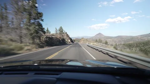 Driving POV down a winding canyon highway in the Oregon high desert Stock Footage 346794766