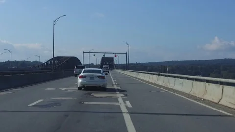  Driving POV - Driving on highway on bridge Stock Footage