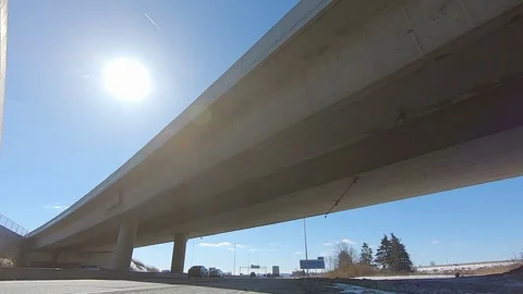 Driving POV low angle fast to the pavement on highway with traffic Stock Footage 103091535