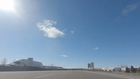 Driving POV low angle fast to the pavement on highway with traffic Stock Footage 103094207