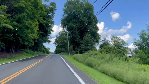 Driving POV Moving Along Two-Lane Country Road Past Trees Stock Footage 343318325