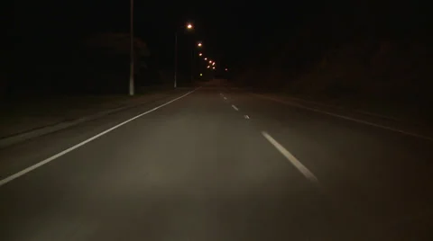 Driving POV night dashed white lines rural Stock Footage 23917078