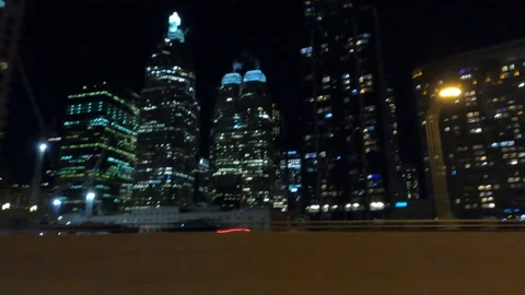 Driving POV side view city streets on a very dark pitch black night Stock Footage 168170566