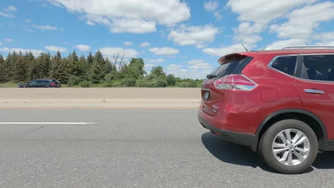 Driving  POV side view on highway at high speed with cars and truck traffic Stock Footage 158335683