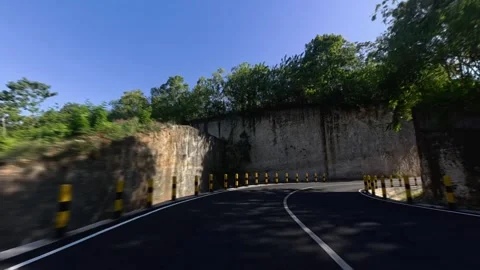 Driving pov on winding mountain road through rock canyon Stock-Footage 344845008