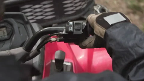 Driving Quad Bike along Bumpy Road 스톡 동영상 142484637