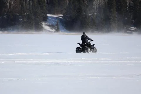 Driving a Quad in Winter Stock Photos