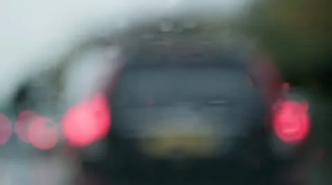 Driving in the rain 2 Stock Footage 12609028