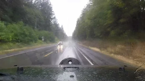 Driving in the rain Vídeo Stock 172458645