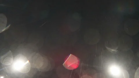 Driving in the rain in LA, looking up into the rain. Stock Footage 99605427